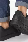 Tommy siyah
